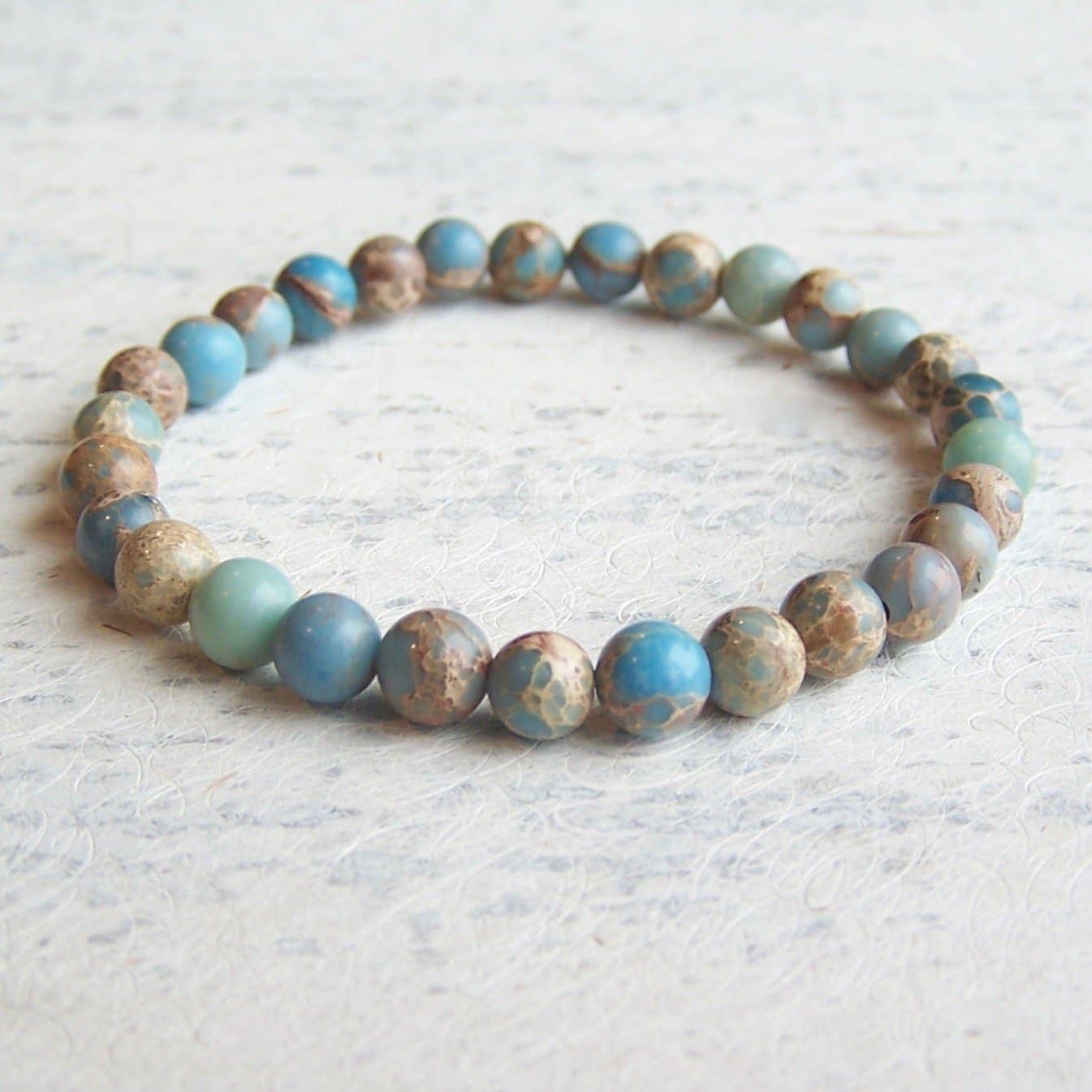 Jo Bird Jewelry Gemstone Elastic Bracelet - 6mm Ocean Colors Carolina Blue Sea Sediment Jasper
